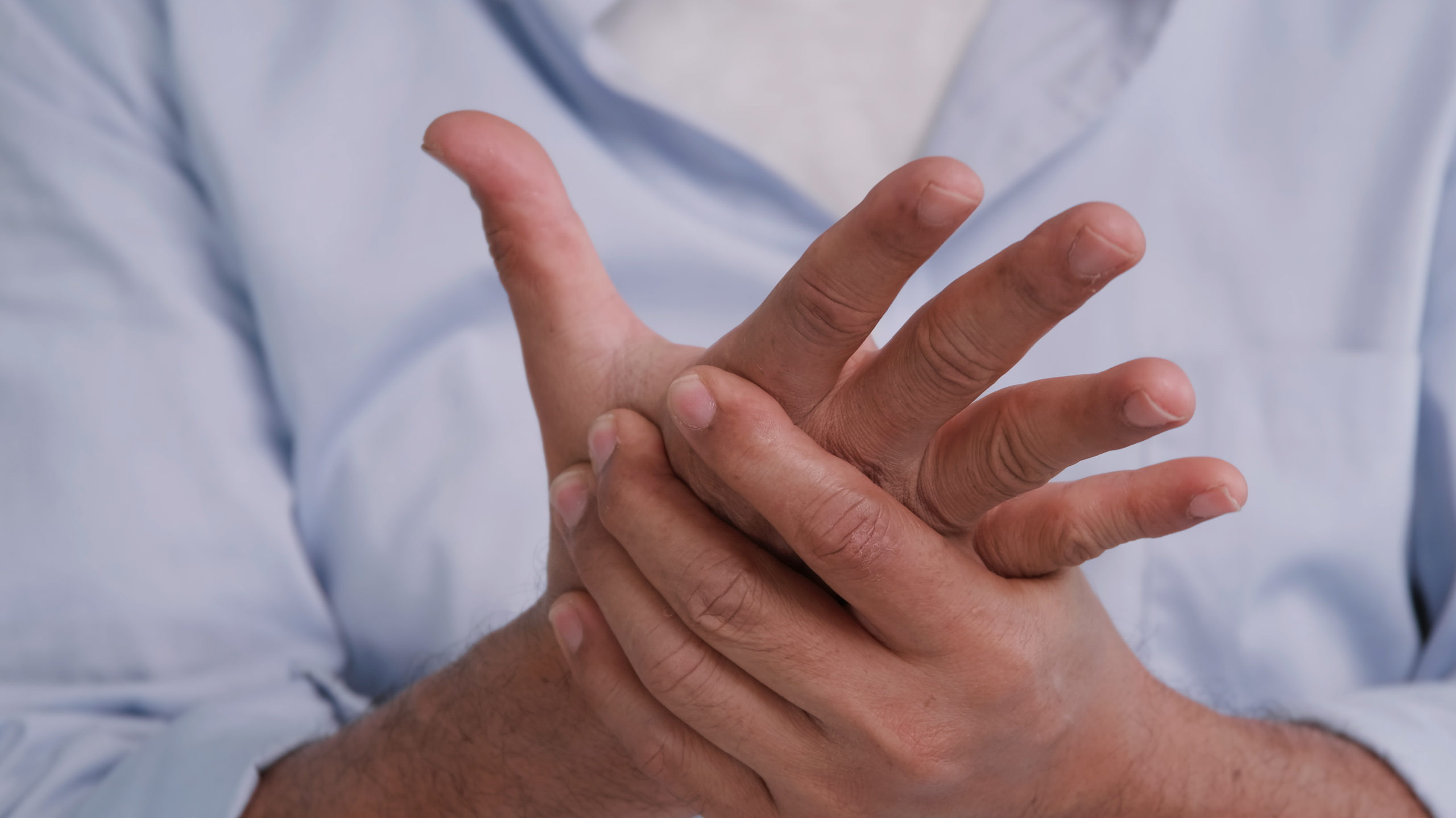 Tingling and numbness in his hand which causes pain
