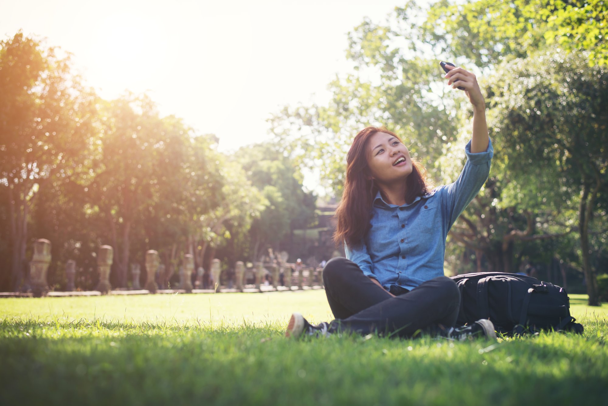 woman enjoying outdoors despite allergies